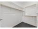 Bright walk-in closet with double hanging rods and shelving at 2425 W Bronco Butte Trl # 2017, Phoenix, AZ 85085
