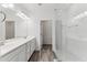 Modern bathroom with double vanity and glass shower at 2425 W Bronco Butte Trl # 2017, Phoenix, AZ 85085