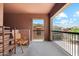 Private balcony overlooking community; features a chair and shelves at 2425 W Bronco Butte Trl # 2017, Phoenix, AZ 85085