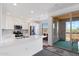 Modern kitchen with white cabinets and stainless steel appliances at 2425 W Bronco Butte Trl # 2017, Phoenix, AZ 85085