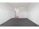 Spacious bedroom with grey carpet and access to hallway at 2425 W Bronco Butte Trl # 2017, Phoenix, AZ 85085
