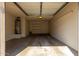 Single car garage with extra storage shelving at 5610 S Doubloon Ct # E, Tempe, AZ 85283