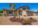 Two story home with a two car garage and desert landscaping at 2438 W Hearn Rd, Phoenix, AZ 85023