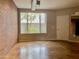 Living room with exposed brick wall and concrete floors at 1701 E Colter St # 141, Phoenix, AZ 85016