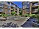 Community courtyard with fountain, landscaping, and brick paving at 1701 E Colter St # 291, Phoenix, AZ 85016