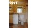 Bathroom with granite countertop, white cabinets, and tiled floor at 1701 E Colter St # 291, Phoenix, AZ 85016
