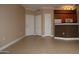 Living Room, Kitchen, and entryway with tile flooring at 1701 E Colter St # 291, Phoenix, AZ 85016