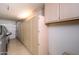 Garage with built-in storage cabinets and extra space at 18000 N Estrella Vista Dr, Surprise, AZ 85374