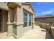 View of house exterior showcasing a window with window coverings at 18000 N Estrella Vista Dr, Surprise, AZ 85374