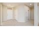 Bright entryway with tile flooring, coat closet and access to other rooms at 18000 N Estrella Vista Dr, Surprise, AZ 85374