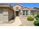 House exterior featuring a walkway to the front door and drought-tolerant landscaping at 18000 N Estrella Vista Dr, Surprise, AZ 85374