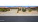 Single story home with attached garage and desert landscaping at 18000 N Estrella Vista Dr, Surprise, AZ 85374
