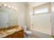 Clean bathroom, granite countertop, single sink and shower/tub combo at 18000 N Estrella Vista Dr, Surprise, AZ 85374