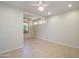 Spacious dining area with tile flooring and adjacent room access at 18000 N Estrella Vista Dr, Surprise, AZ 85374