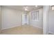 Well-lit bedroom with tile floors, ceiling fan, and window shutters at 18000 N Estrella Vista Dr, Surprise, AZ 85374