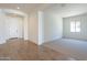 Bright entryway with tile flooring and arched hallway at 18944 W Ocotillo Rd, Waddell, AZ 85355