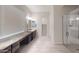 Elegant bathroom with double vanity, large shower, and granite countertops at 10611 E Tumbleweed Ave, Mesa, AZ 85212