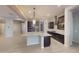 Spacious kitchen with large island, granite countertops, and stainless steel appliances at 10611 E Tumbleweed Ave, Mesa, AZ 85212