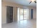 Living room with sliding doors leading to backyard at 10611 E Tumbleweed Ave, Mesa, AZ 85212