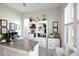 Home office with built-in shelving and large desk at 10611 E Tumbleweed Ave, Mesa, AZ 85212