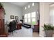 Home office with built-in desk and plenty of natural light at 10611 E Tumbleweed Ave, Mesa, AZ 85212