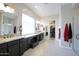 Primary bathroom with double vanity and walk-in shower at 10611 E Tumbleweed Ave, Mesa, AZ 85212