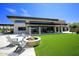 Community clubhouse with fire pit and seating area at 10611 E Tumbleweed Ave, Mesa, AZ 85212