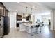 Spacious kitchen with island, stainless steel appliances, and granite countertops at 10611 E Tumbleweed Ave, Mesa, AZ 85212