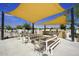 Community BBQ area with shade sails and picnic tables at 10611 E Tumbleweed Ave, Mesa, AZ 85212