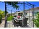 Covered patio with dining set and string lights at 10611 E Tumbleweed Ave, Mesa, AZ 85212