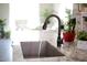 Modern kitchen sink with oil-rubbed bronze faucet at 10611 E Tumbleweed Ave, Mesa, AZ 85212