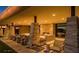 Covered patio features comfortable seating and lighting at 10611 E Tumbleweed Ave, Mesa, AZ 85212