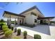 Modern clubhouse with stone exterior and landscaping at 10611 E Tumbleweed Ave, Mesa, AZ 85212