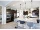 Modern kitchen with granite countertops and stainless steel appliances at 10611 E Tumbleweed Ave, Mesa, AZ 85212