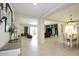 Open living space with views into dining area and kitchen at 10611 E Tumbleweed Ave, Mesa, AZ 85212