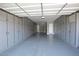 Spacious garage with built-in storage cabinets at 10611 E Tumbleweed Ave, Mesa, AZ 85212