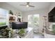 Bright home office with built-in shelving and a large desk at 10611 E Tumbleweed Ave, Mesa, AZ 85212