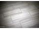 Modern gray tile flooring throughout the home at 10611 E Tumbleweed Ave, Mesa, AZ 85212