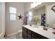 Bathroom with double sinks and a star-themed decor at 10611 E Tumbleweed Ave, Mesa, AZ 85212