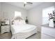 Main bedroom with a large bed and neutral decor at 10611 E Tumbleweed Ave, Mesa, AZ 85212