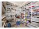 Large walk-in pantry with ample shelving at 10611 E Tumbleweed Ave, Mesa, AZ 85212