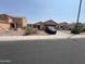 House exterior view from the street at 22005 W Cocopah St, Buckeye, AZ 85326