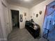 Home hallway with tile flooring and storage at 22005 W Cocopah St, Buckeye, AZ 85326