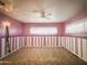 Charming bedroom with pink walls and a ceiling fan at 120 N Val Vista Dr # 264, Mesa, AZ 85213