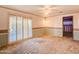 Spacious bedroom with sliding glass doors and neutral carpeting at 120 N Val Vista Dr # 264, Mesa, AZ 85213