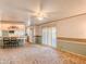 Living room with view of kitchen and sliding glass doors at 120 N Val Vista Dr # 264, Mesa, AZ 85213
