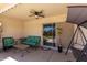 Covered patio with seating area and ceiling fan at 745 E Megan St, Chandler, AZ 85225