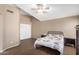 Bright bedroom featuring tile floors and a double door closet at 745 E Megan St, Chandler, AZ 85225