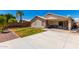 Landscaped backyard with patio and grassy area at 745 E Megan St, Chandler, AZ 85225