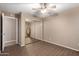 Bedroom with mirrored closet and wood flooring at 745 E Megan St, Chandler, AZ 85225